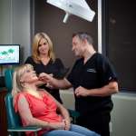 Dr. Sawisch and a member of his team with a patient
