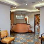 Reception and waiting room at {PRACTICE_NAME}